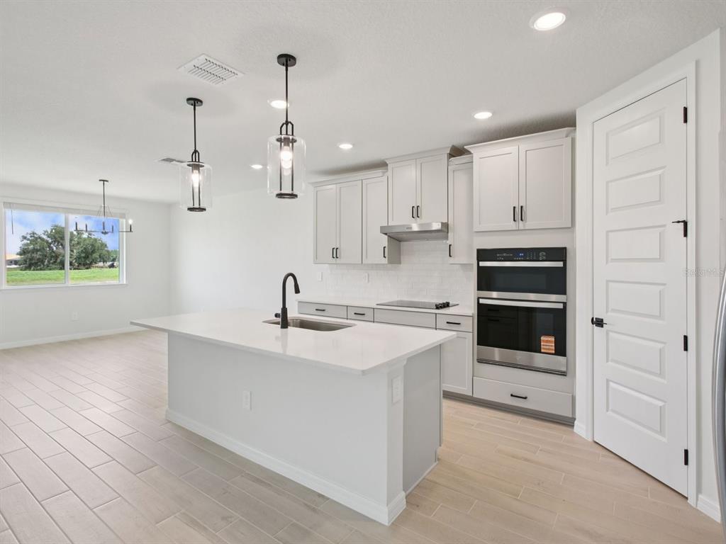 Interior photos are not of the actual home but are photos of the builder home with the same floorplan with similar interior finishes and features.