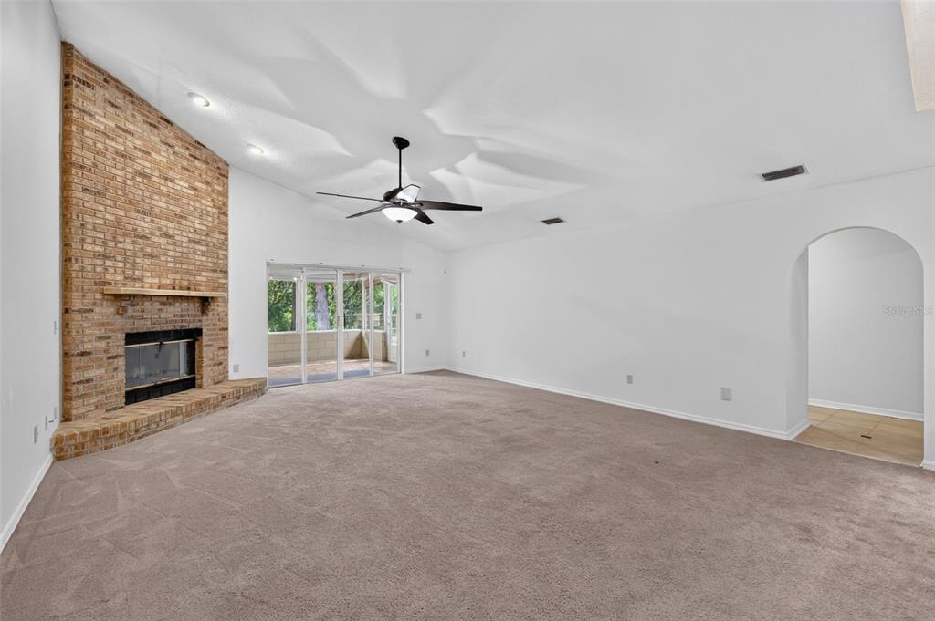 Living Room with Woodburning Fireplace