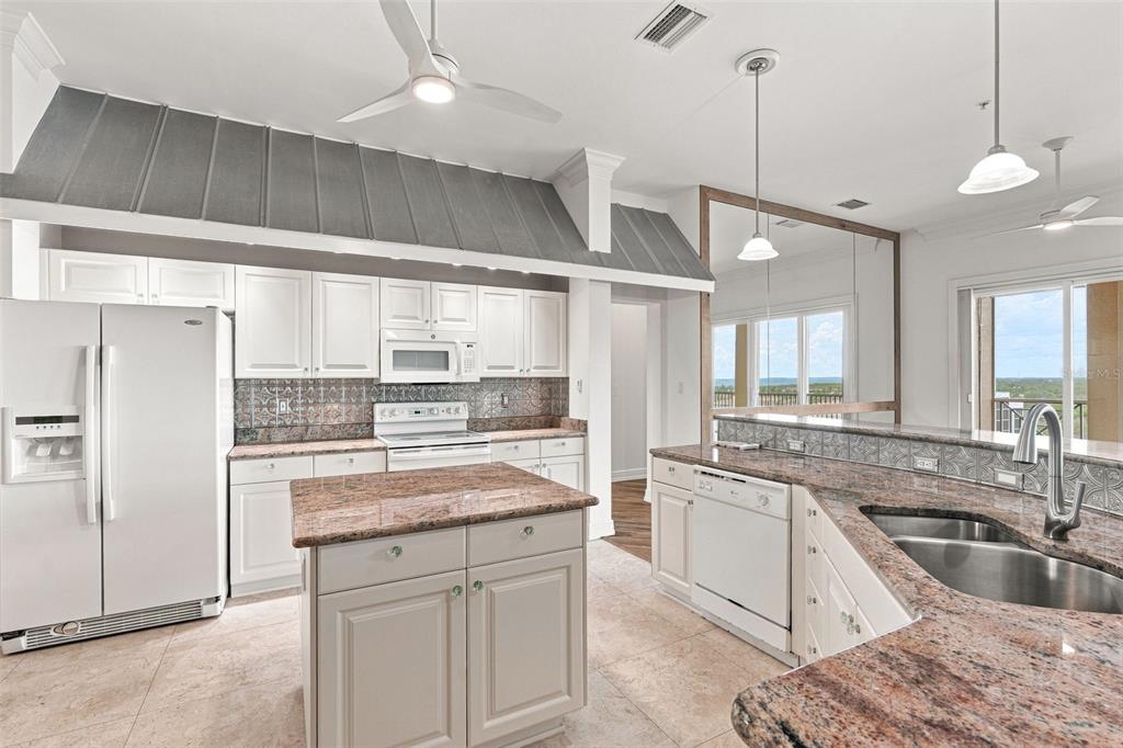 Center Island/ Decorative Canopies/  Granite Plus Endless Water Views