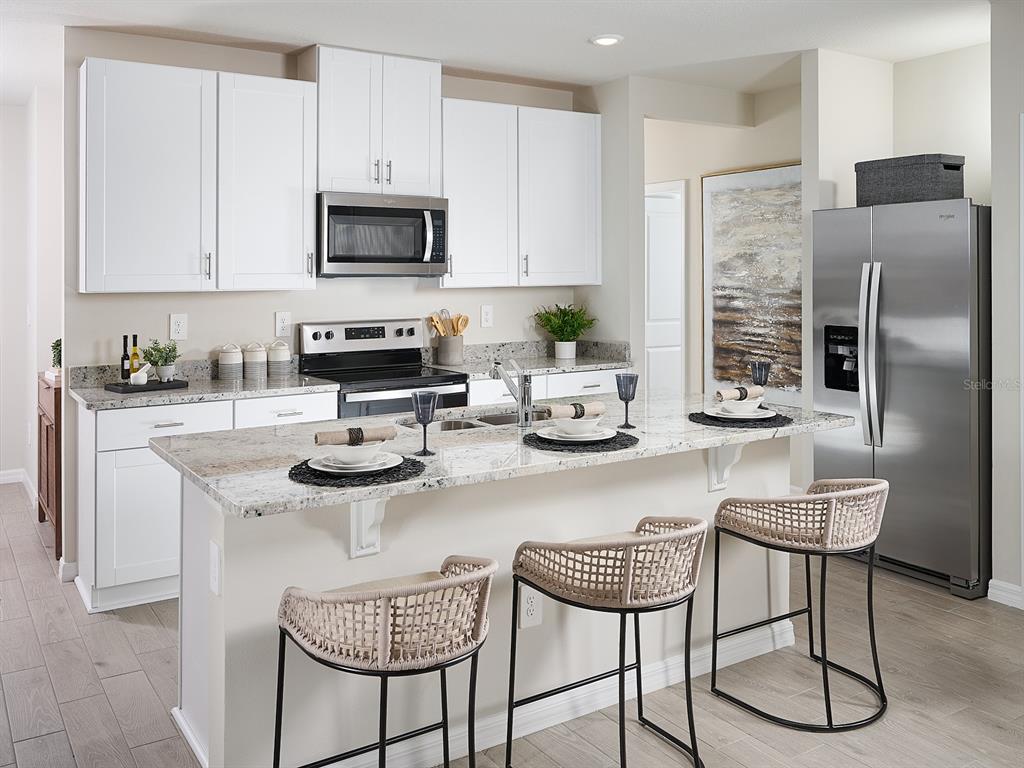 Photo is not of the actual home, but is an inspirational photo of builder’s model home and may depict options, furnishings, and/or decorator features that are not included.