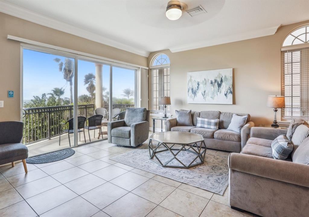 “An elevated living space blending comfort, style, and serene waterfront scenery.”