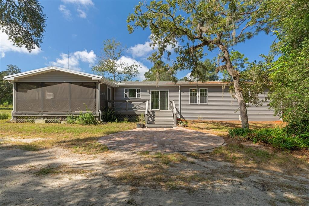 Welcome to 16344 Platinum Dr - a 2020 home set on 3.46 acres in Spring Hill, Pasco County