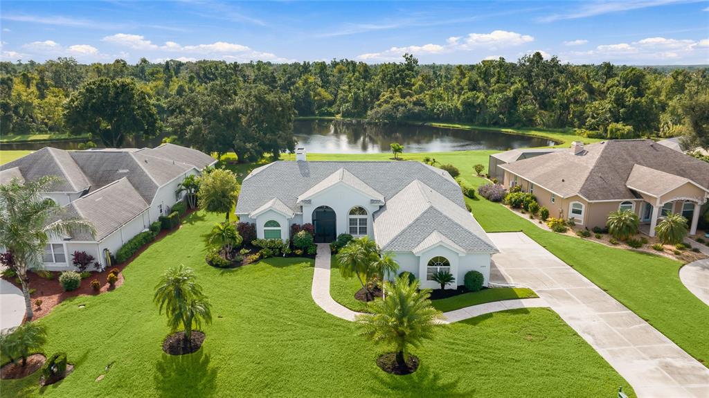 Welcome to the River Wilderness lifestyle: lake views, large lots, amenities, activities and a well-maintained home