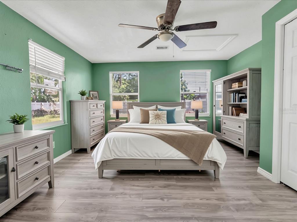 Bedroom 1 off of bonus room virtually staged