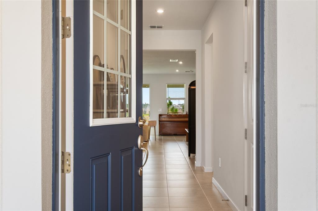 Front door gives way to beautiful natural light and well laid out split plan.