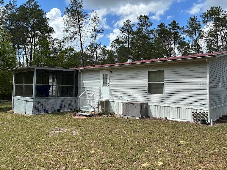 Back of house with porch