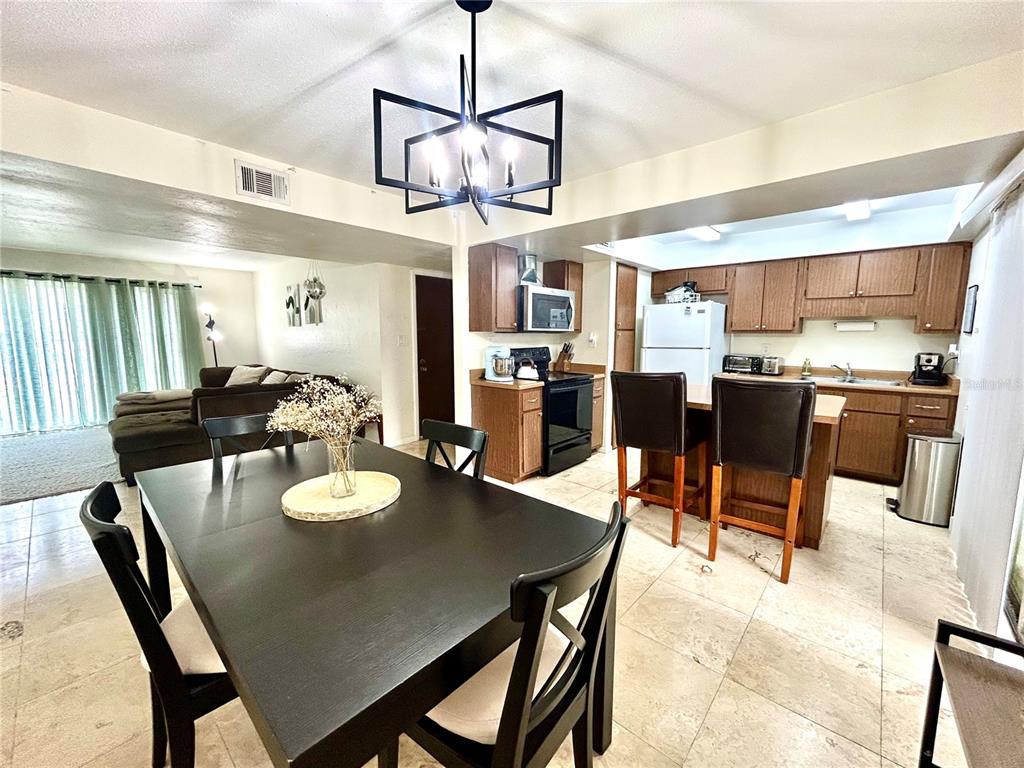 Dining Room and Kitchen with Breakfast Bar