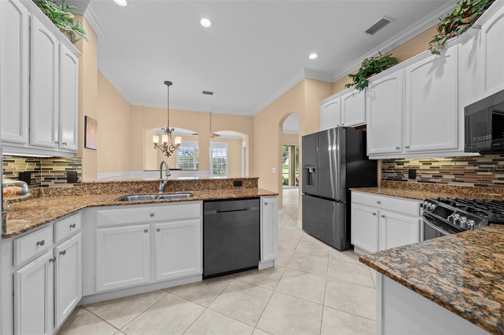 An open kitchen layout offers ample prep space while keeping you connected to family and guests.