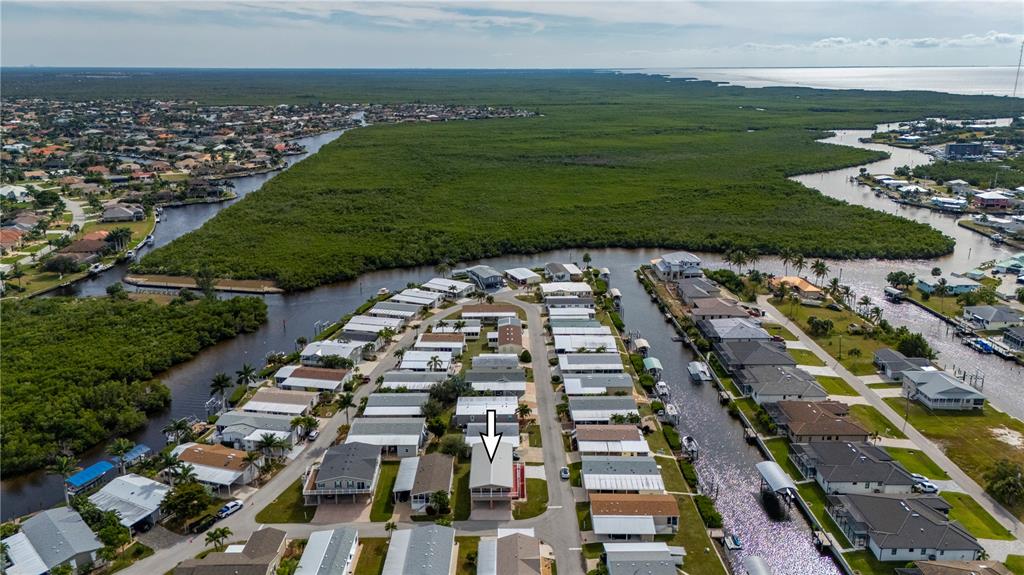 Aerial View Looking South (that's "Alligator Creek" which winds around and exits into Charlotte Harbor through Buckley's Pass).
