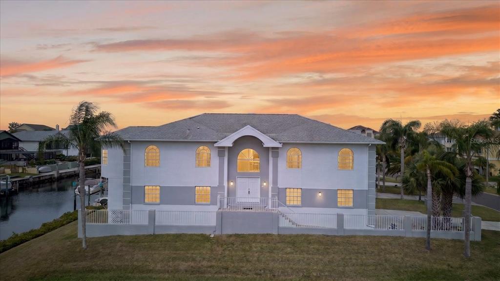 Sunset behind front of house