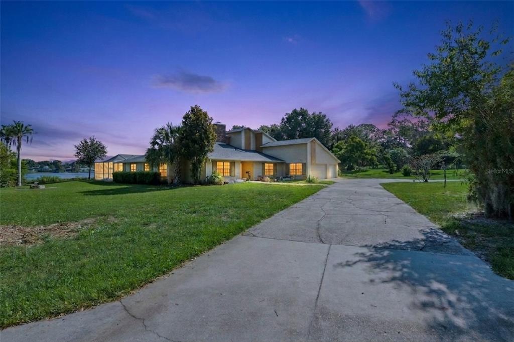 Welcome home to this beautiful lakefront retreat, offering peaceful water views, a spacious homesite, mature landscaping, and plenty of room to enjoy the Florida lifestyle.