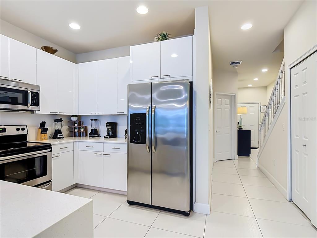 Spacious kitchen with abundant cabinet and counter space