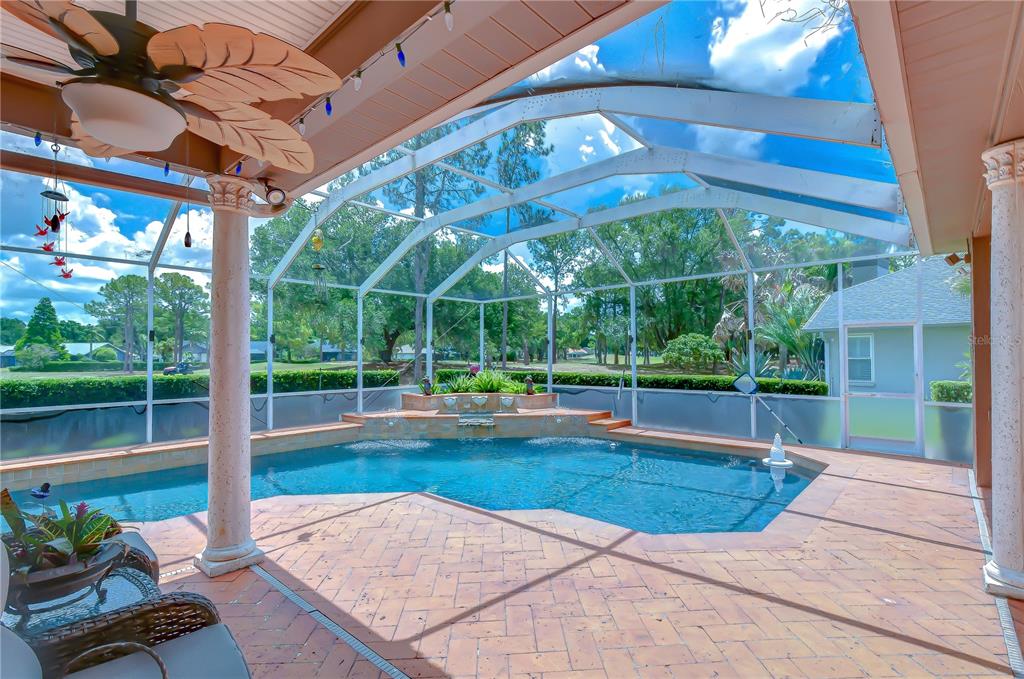 Resort-style saltwater PebbleTec pool — all yours