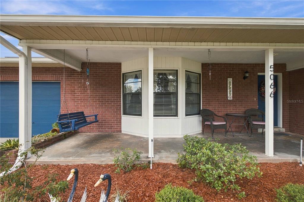 Covered Front Porch with Bay Window