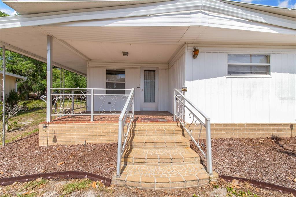 Property for sale at 31 WOODLAND CIRCLE, HAINES CITY, FL, 33844