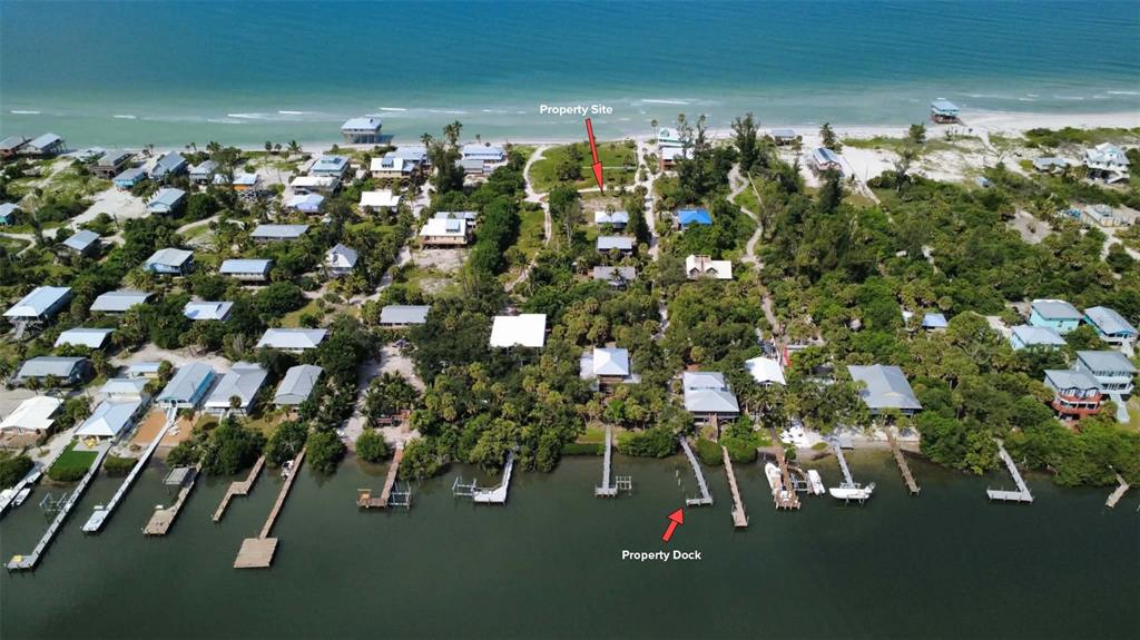 Dock, Path, Home site, Deeded beach access toright of home site.