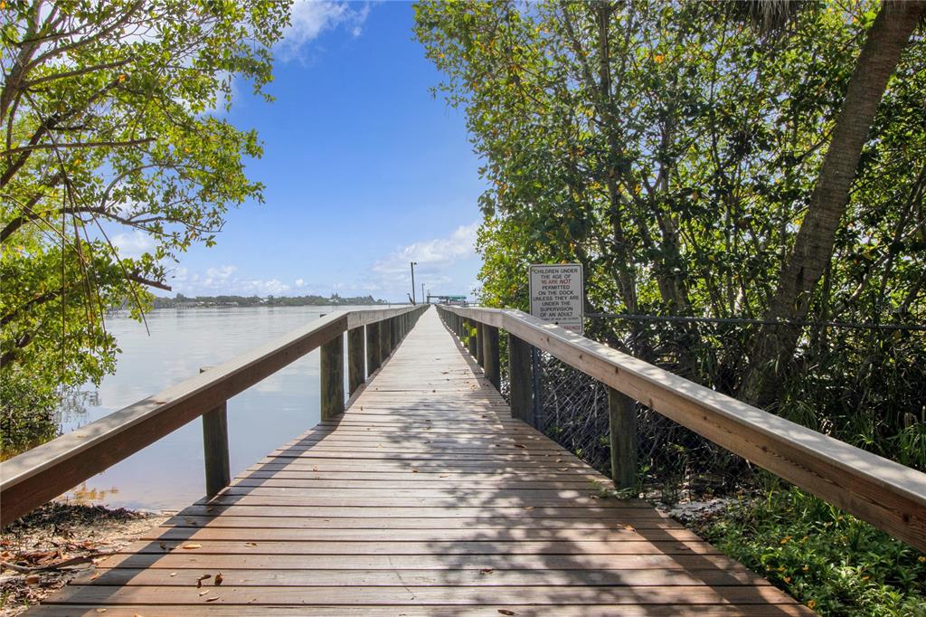 Walking path leading to fishing pier and boat docks. Docks are approved and all assessments paid for rebuild in 2026
