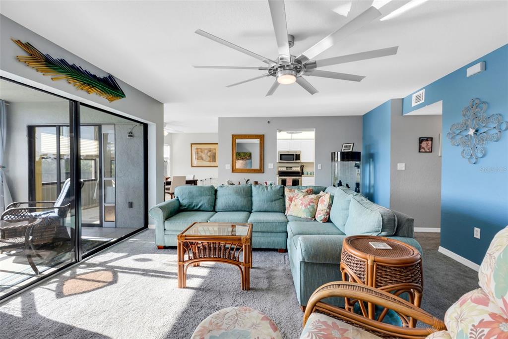 Living Room in your new low-maintenance SWFL condo! Bonus - It comes furnished!