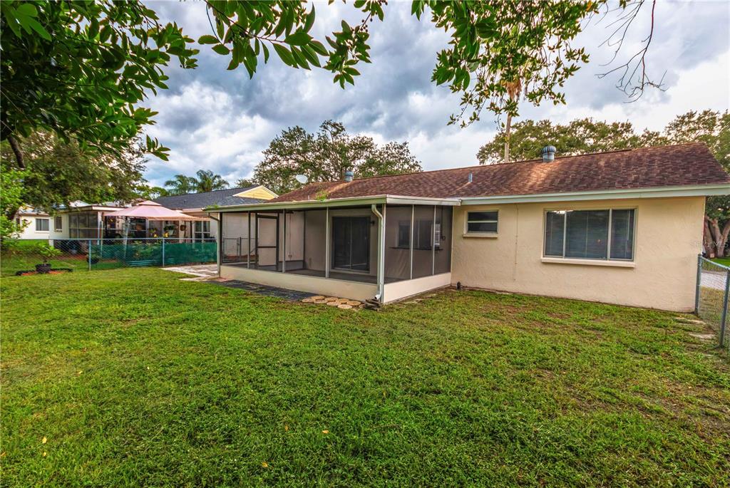 spacious fenced back yard