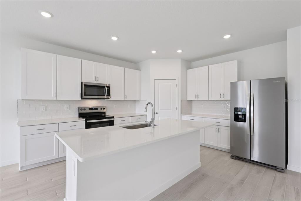 The interior photos are of another home with the same floor plan and interior finishes. Some details may vary