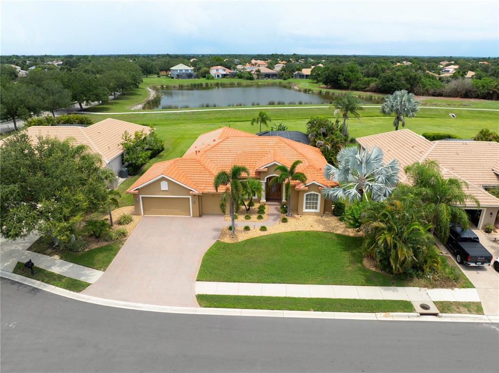 Front Aerial View with Lake