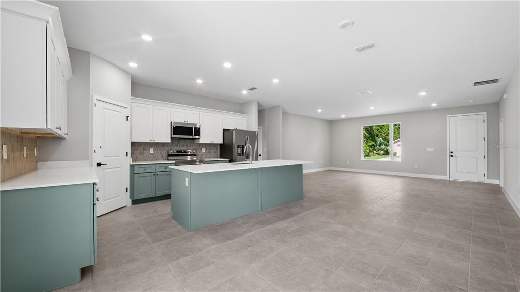 Kitchen.  Colors and finishes may vary.