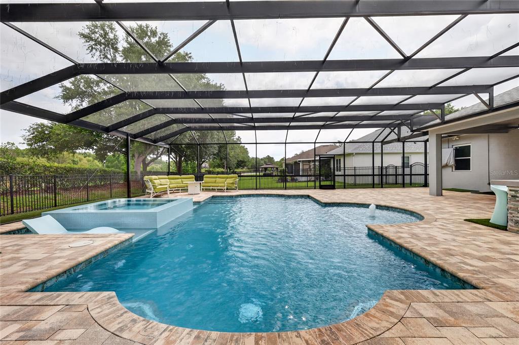Pool is 16' x 34' with glow in the dark toe tile for evening swims ~