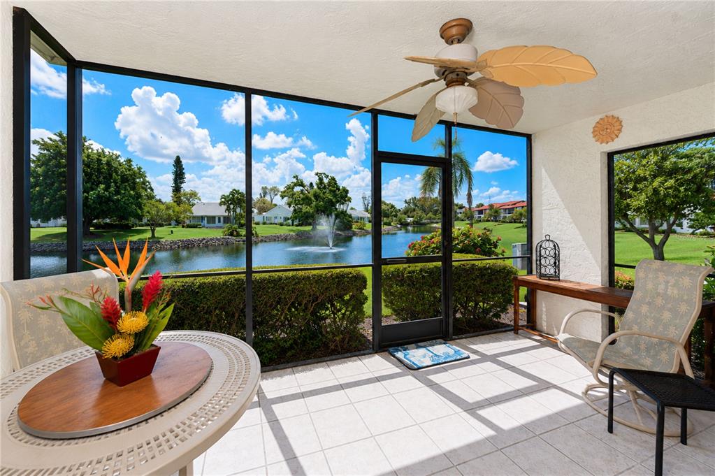 Relax on the screened lanai and bird watch by day