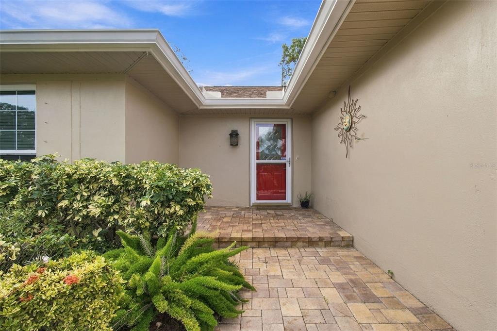 Lovely paved entry to greet your family and friends.