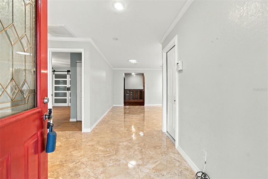 A spacious foyer leads into this stunning home.
