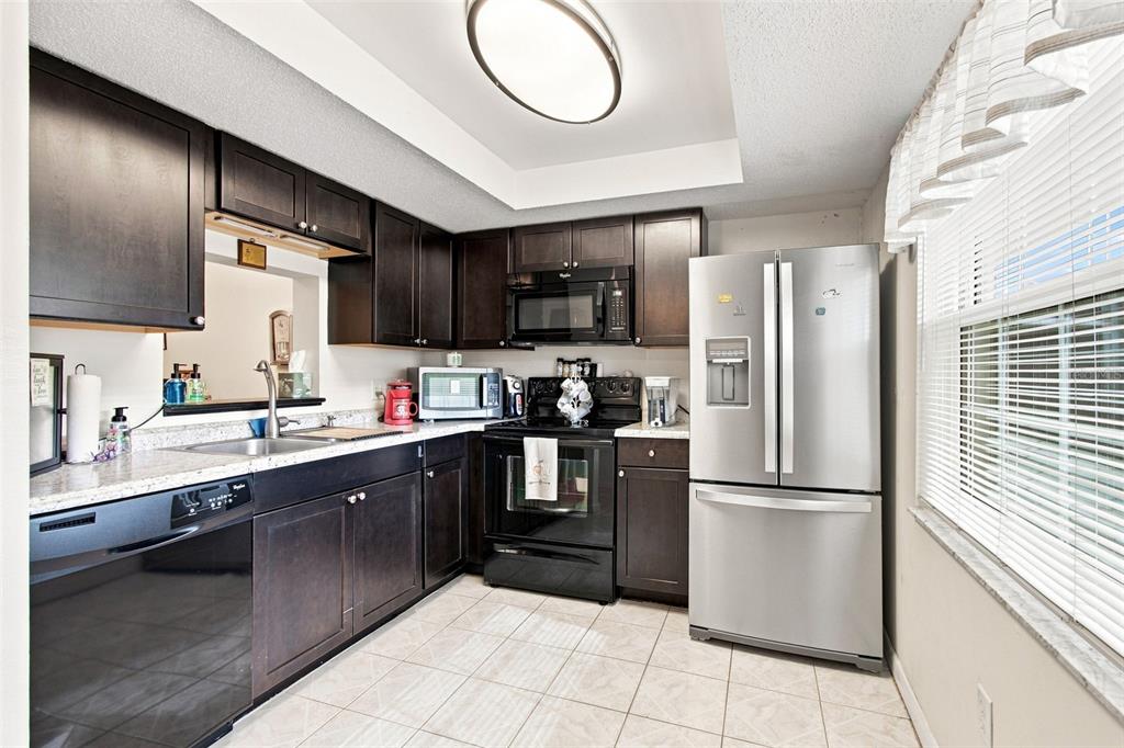 Property for sale at 1370 HEATHER RIDGE BOULEVARD UNIT 104, DUNEDIN, FL, 34698