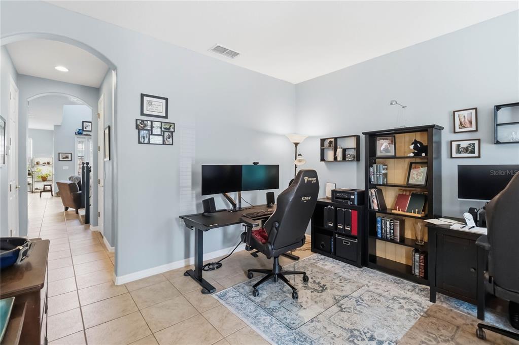 First floor formal living room currently used as an office.