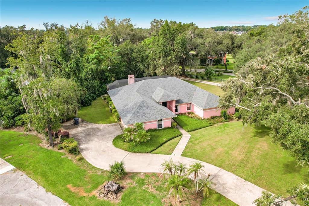 Extra long driveway leading to side entry garage