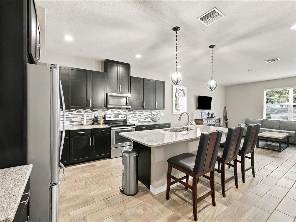 Kitchen overlooking living room.