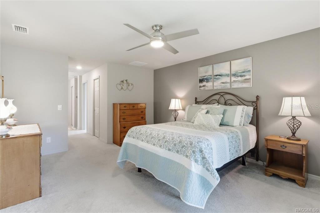 Master Bedroom w/ 2 Walk-in Closets & Ensuite w/ Dual Sinks, Private Water Closet & Tiled Walk-in Shower