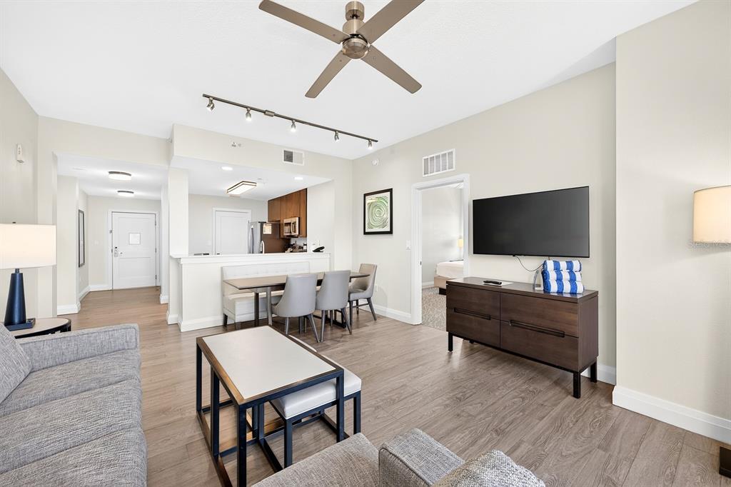 Step inside to find a bright, inviting interior with LUXURY VINYL PLANK FLOORING throughout the main living areas.