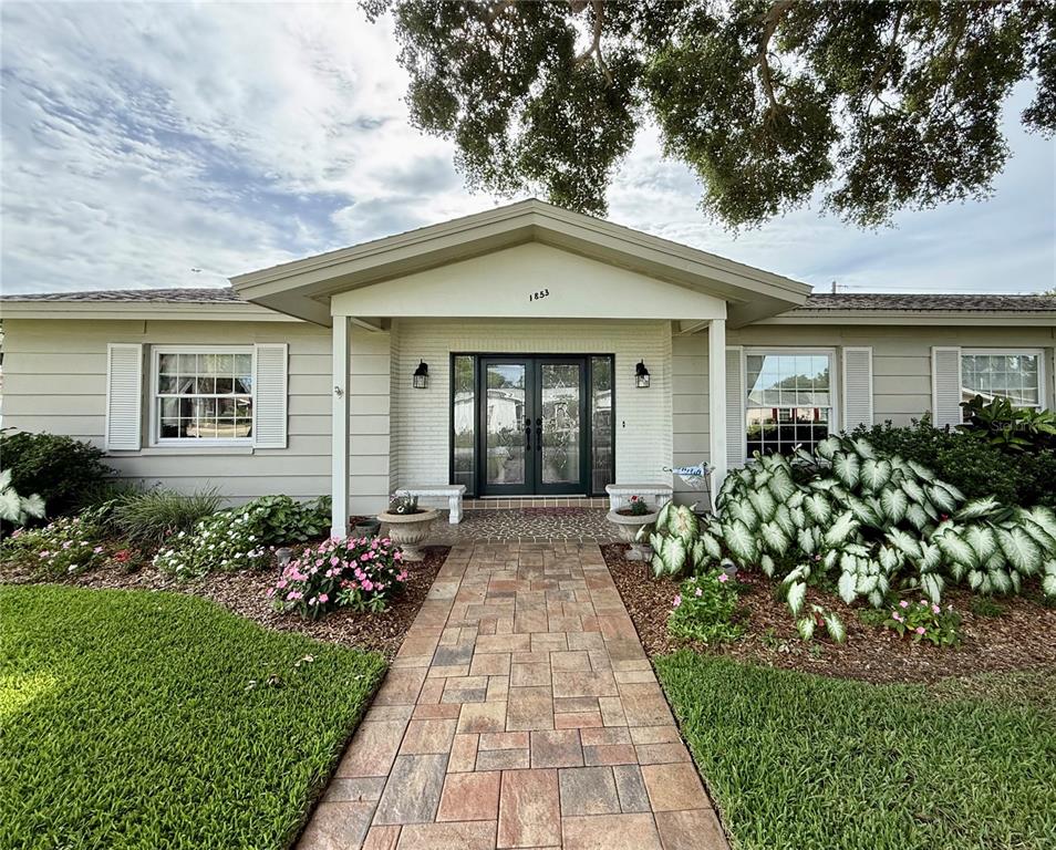 Beautifully landscaped front entrance.