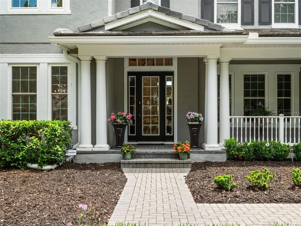 Amazing front porch greets every guest.