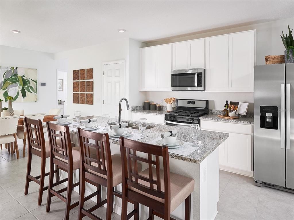 Photo is not of the actual home, but is an inspirational photo of builder’s model home and may depict options, furnishings, and/or decorator features that are not included.