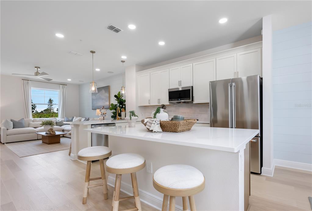 Kitchen:Photo description represents the model home of same floor plan.
