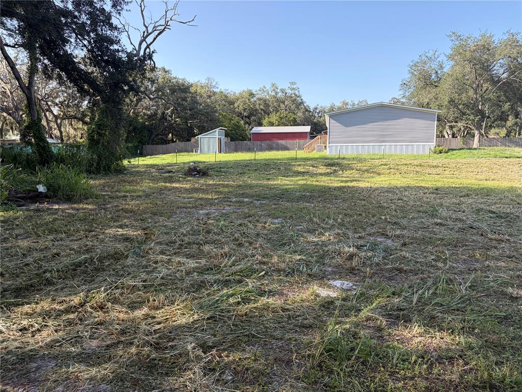 view from northeast side of the lot facing south