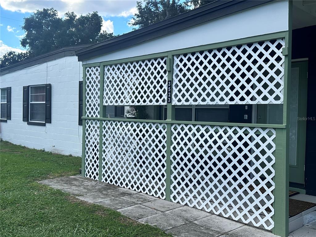 Newly painted trim on lattice