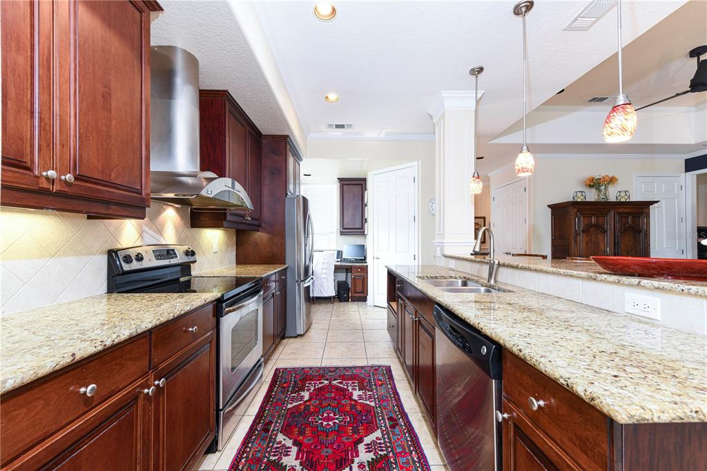 Galley Kitchen with stainless appliances