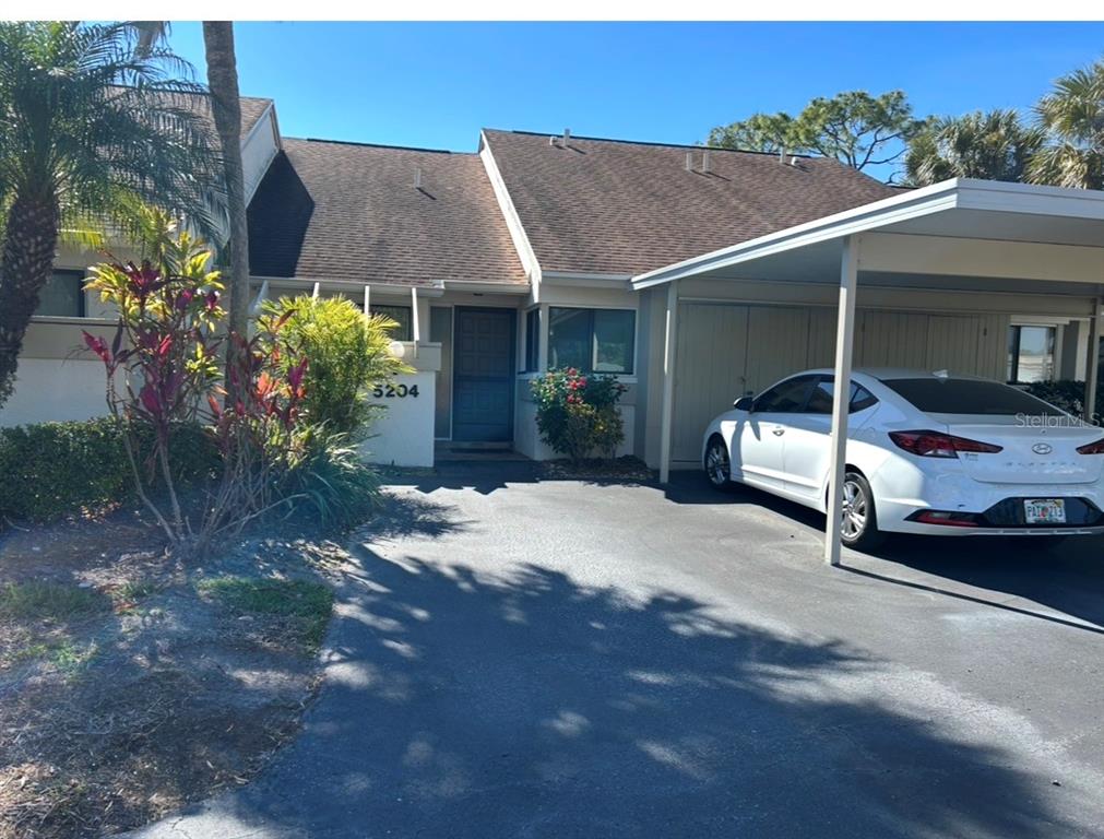 Entrance to the Unit and carport