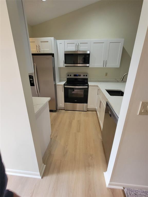 kitchen with all new appliances, new cabinets
