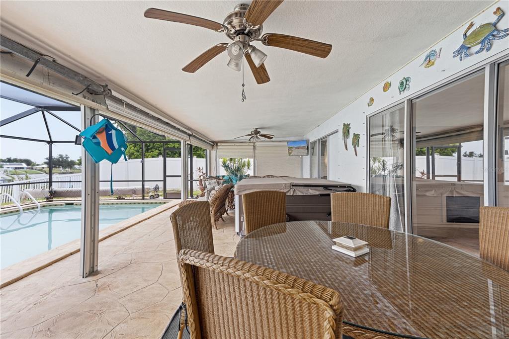 Expansive Covered Patio with Pool, Spa, and Wide Water Views