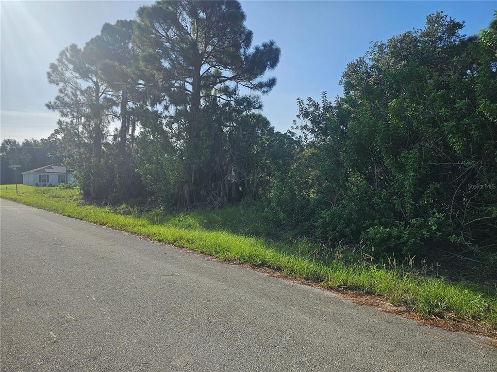 Paved road facing east.