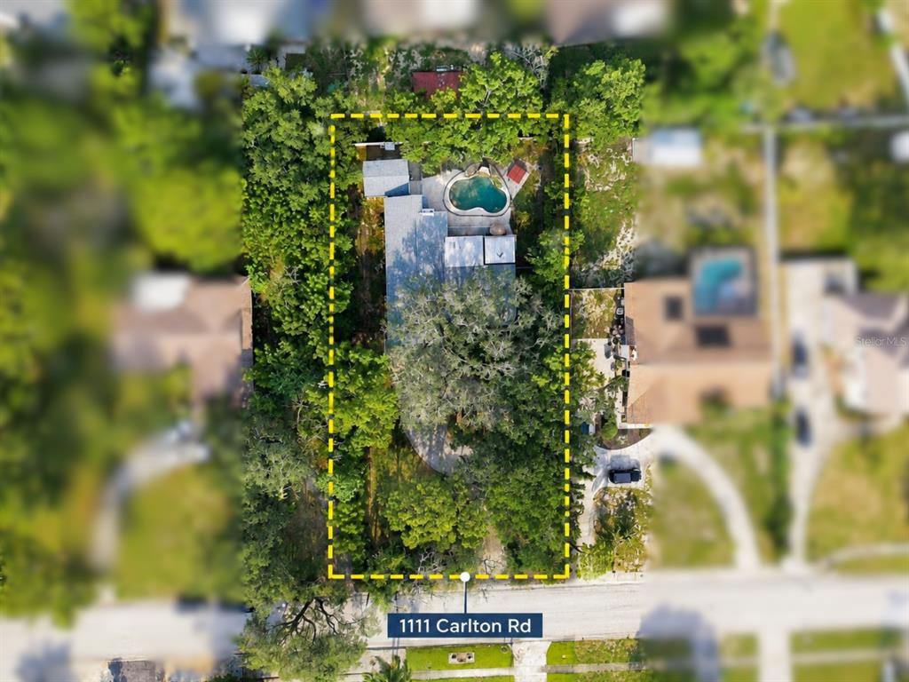 .49 ACRES - X FLOOD - LESS THAN A 5 MINUTE GOLF CART RIDE TO THE BEACH!