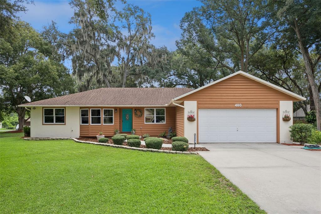 Welcome home to 480 Lake Forest Cir, a 3-bedroom, 2-bath home with 2-car attached garage on a 0.46-acre cul-de-sac lot in Mount Dora's Lake Forest community, FL 32757