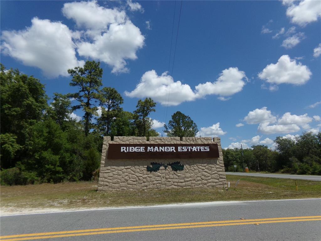 Ridge Manor Estates sign at entrance to neighborhood.